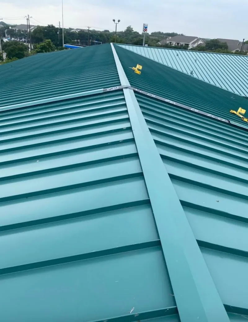 Green commercial metal roof ridge and valley for Metal Roof Repair in Hutchinson